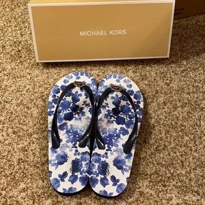 Michael Kors blue floral flip flops